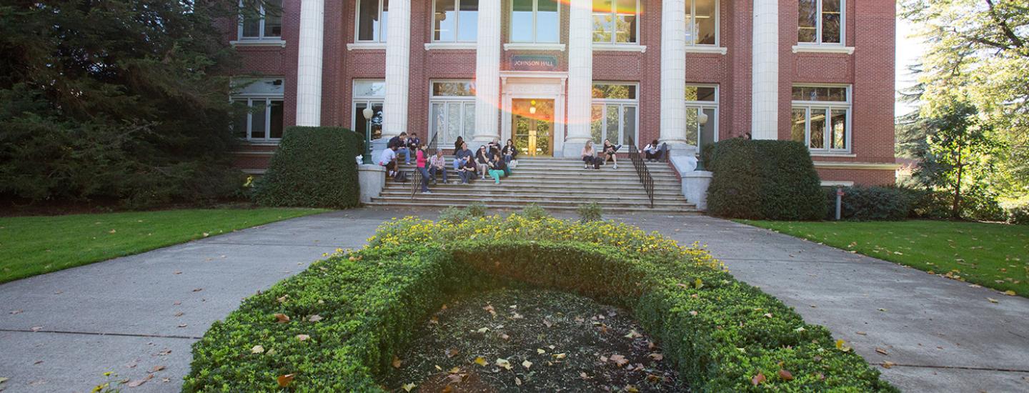 Johnson Hall is where the president and vice president reside. Students sit on the steps of Johnson Hall and socialize.